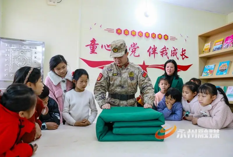 新田：“紅星學(xué)園”度寒假 國防教育潤童心